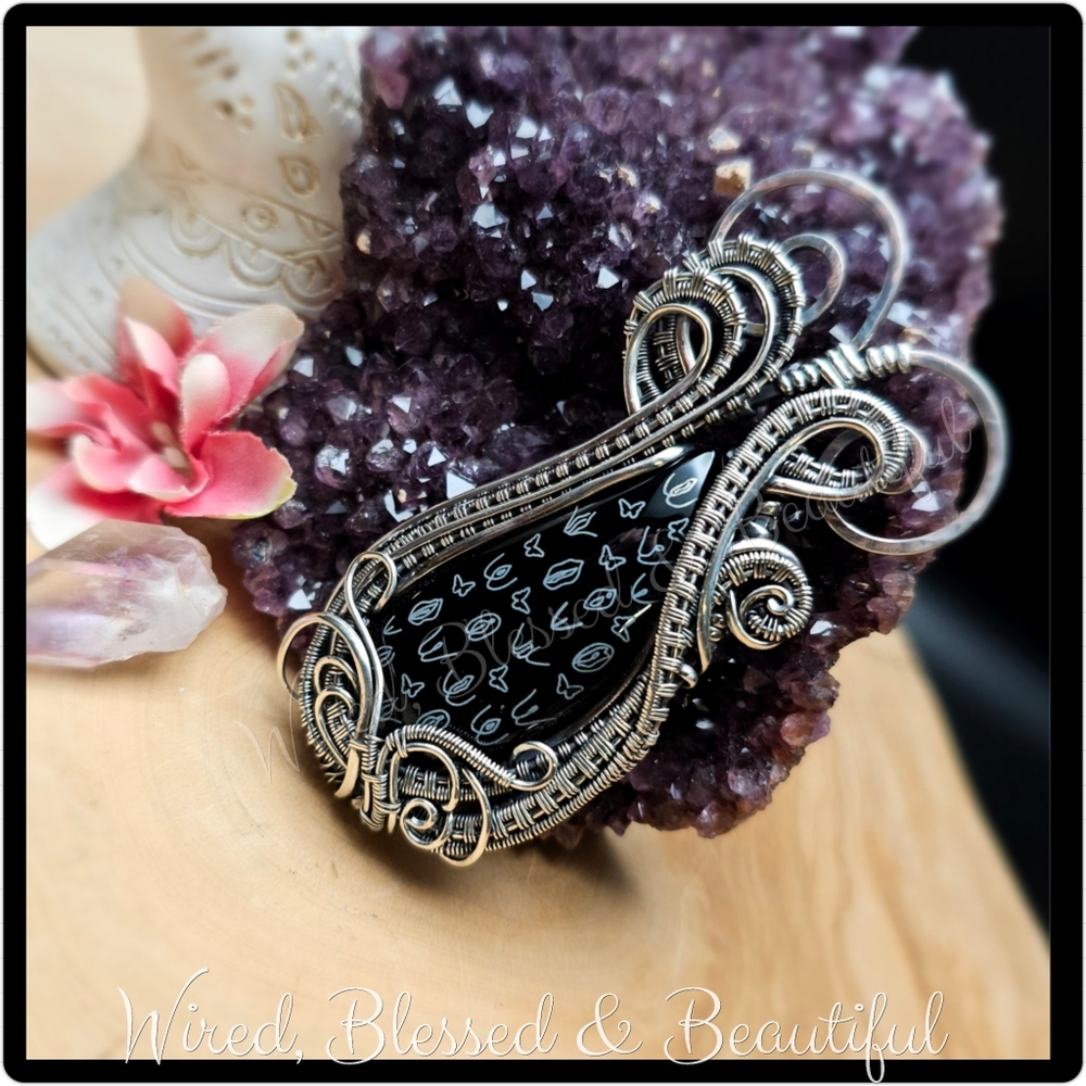 Handmade sterling silver, laser engraved black onyx yoni pendant